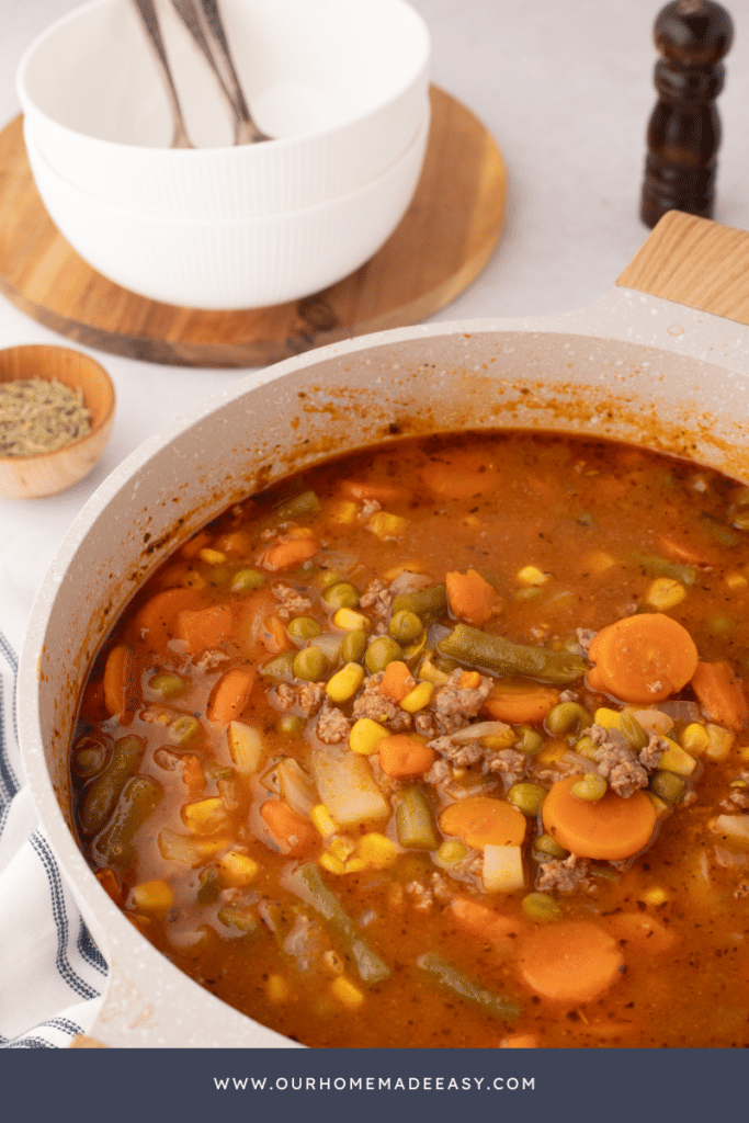 Ground Beef Vegetable Soup in Dutch Oven on CounterTop