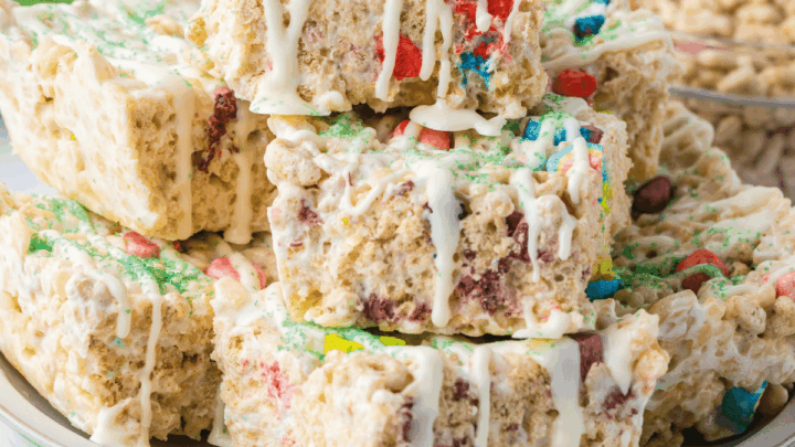 Lucky Charms Rice Krispie Treats cut and stacked on plate