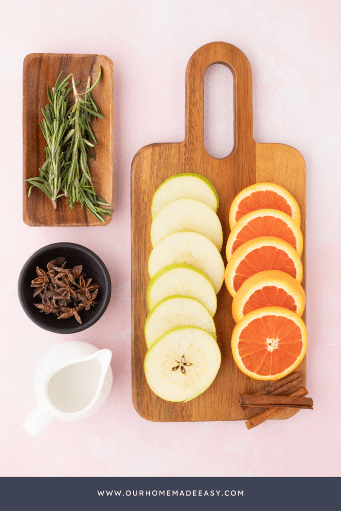 Summer simmer pot  ingredients on pink background