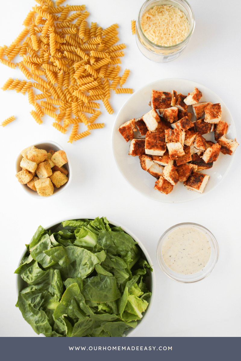 Chicken Caesar Pasta Salad Ingredients on countertop