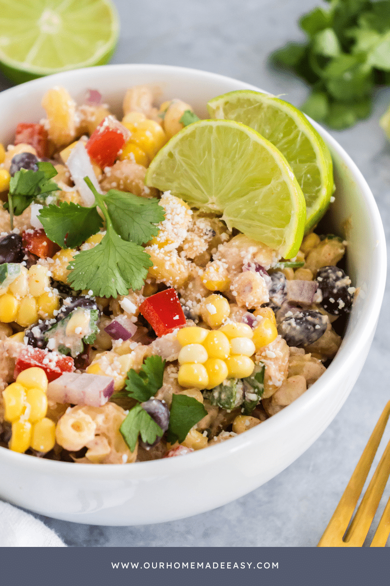 close up of lime dressing and grilled corn salad