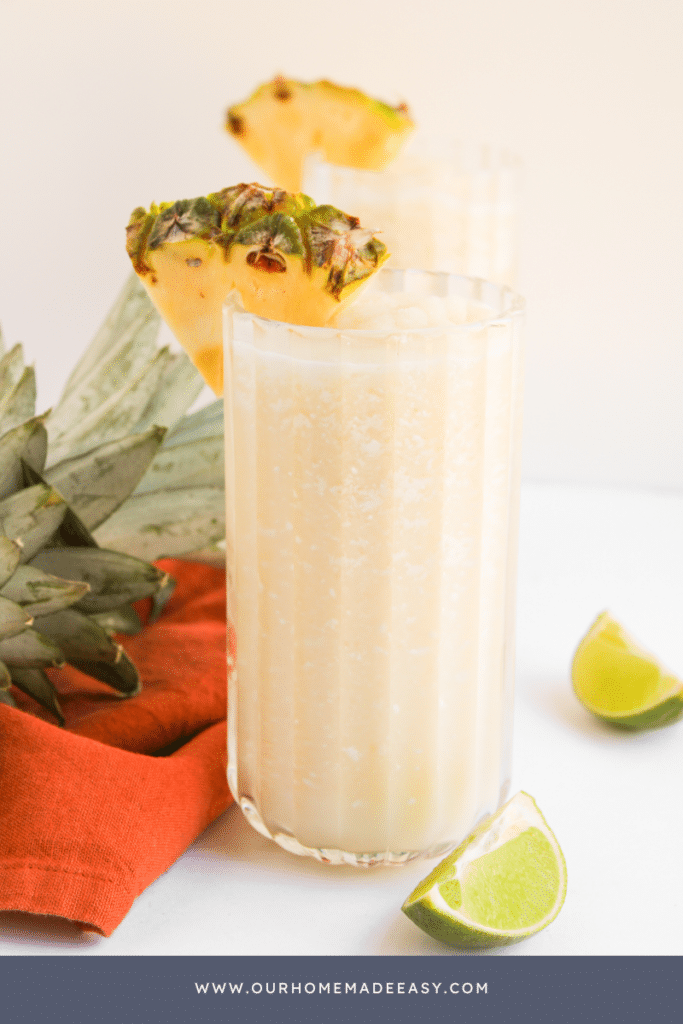 summer pineapple drink with pineapple wedge
