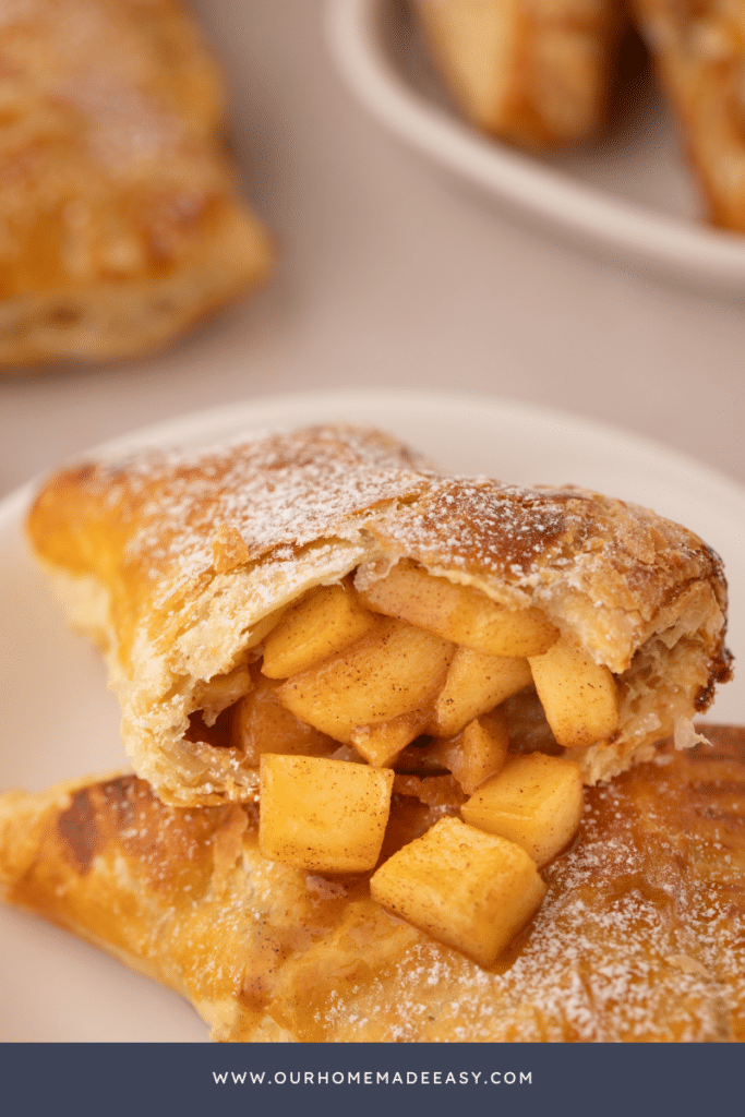 close up of apple pie filling in apple turnover