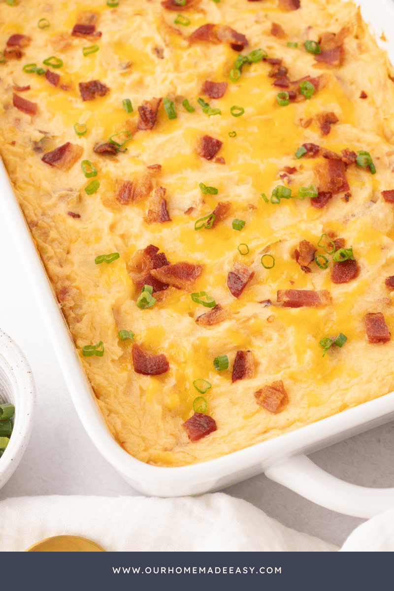 close up of finished baked potato casserole in baking dish