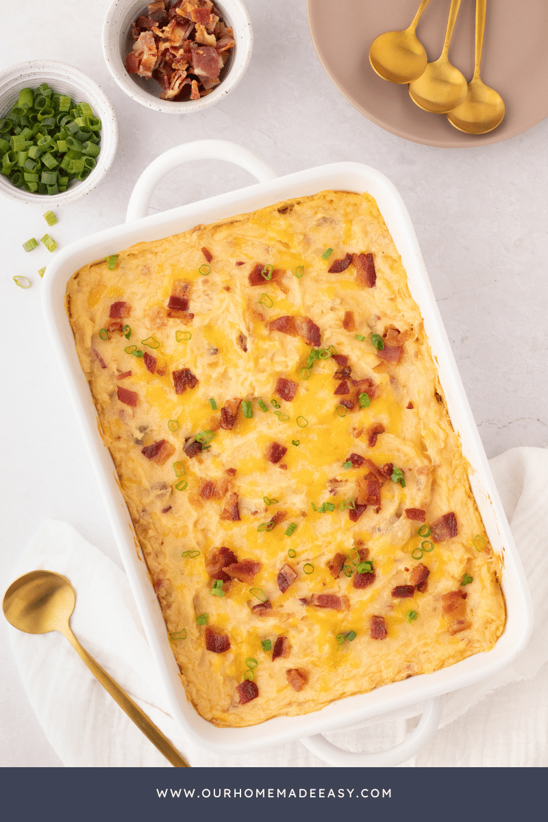 baked potato casserole in white casserole dish