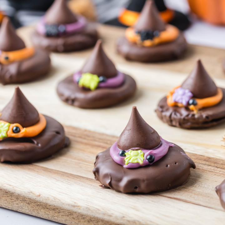 witch hat cookies on cutting board