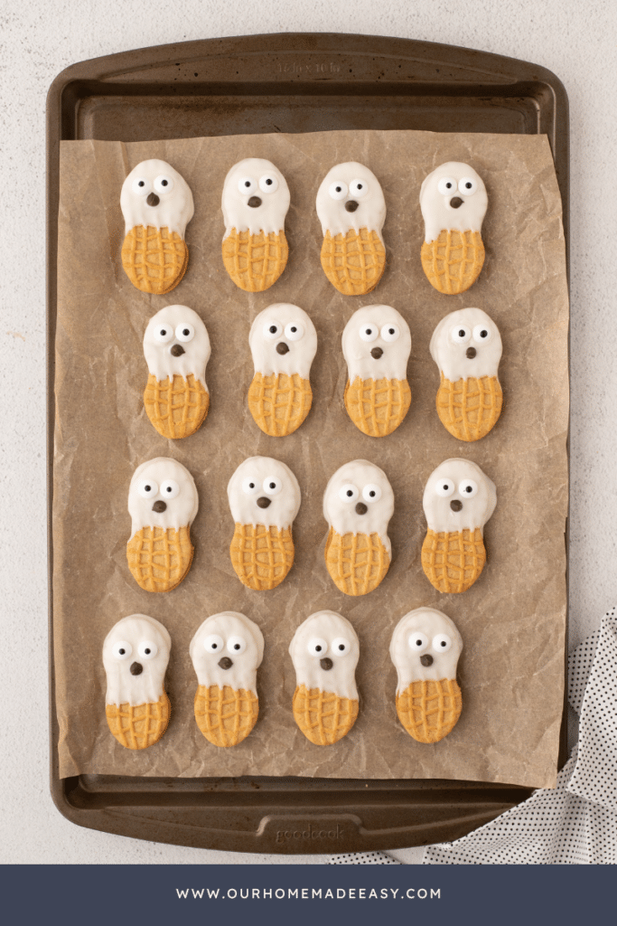 finished spooky cookies on baking sheet