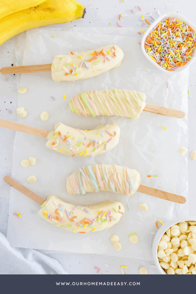 frozen banana popsicles on tray