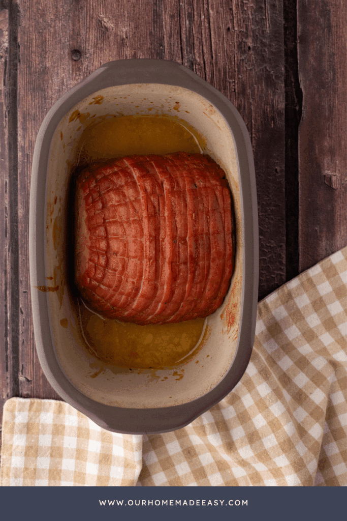finished boneless baked ham in ceramic crock