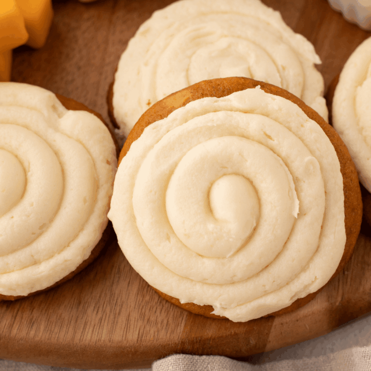 soft pumpkin cookies on cutting board