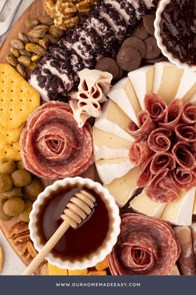 looking at honey and meat and cheese board