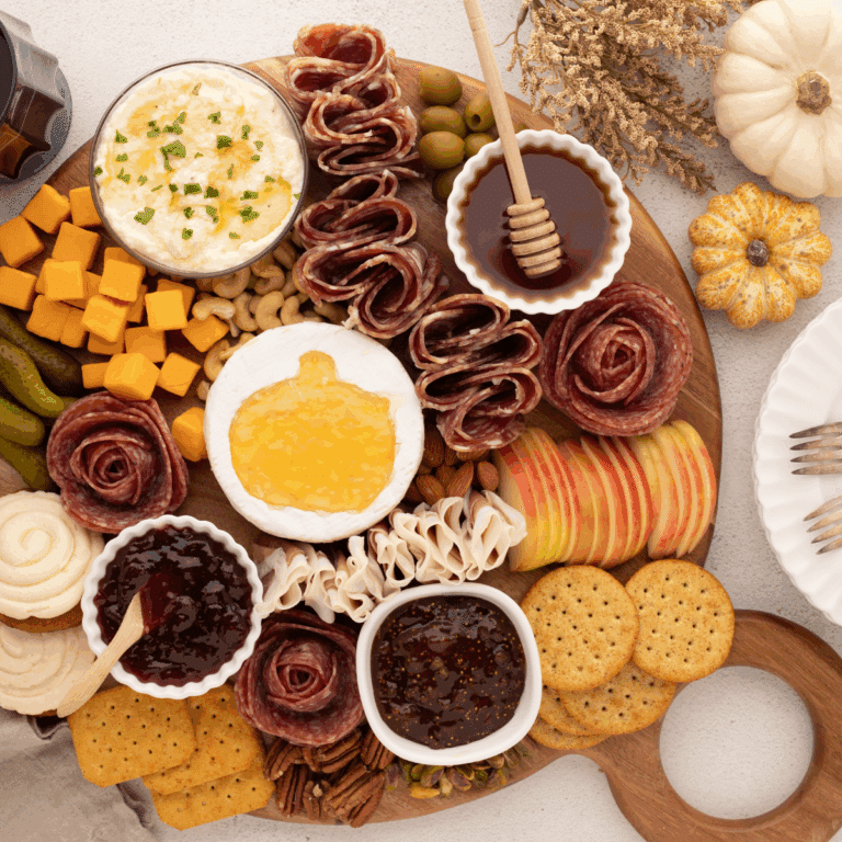 finished Fall charcuterie board on countertop with crackers