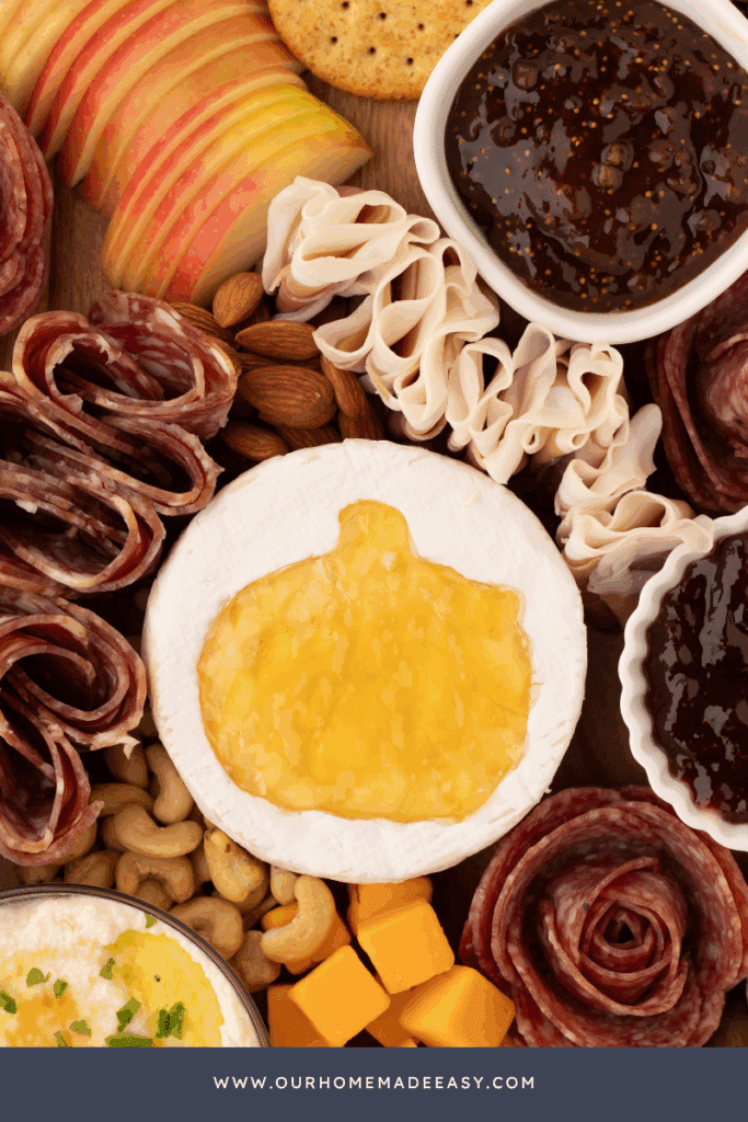 close up of pumpkin shaped brie cheese wheel