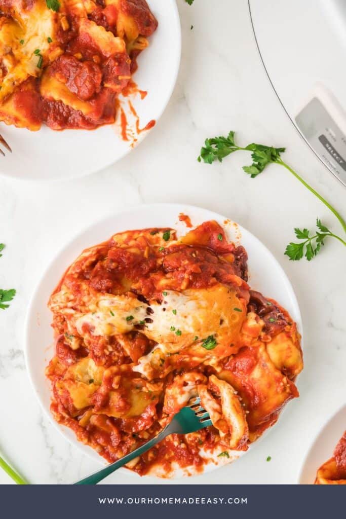 slow cooker ravioli on white plate