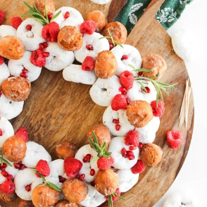 Finished Christmas Mini Donuts wreath no bake on wooden board