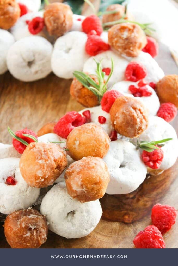 Powdered Mini Donuts, donut holes, raspberries in a holiday wreath
