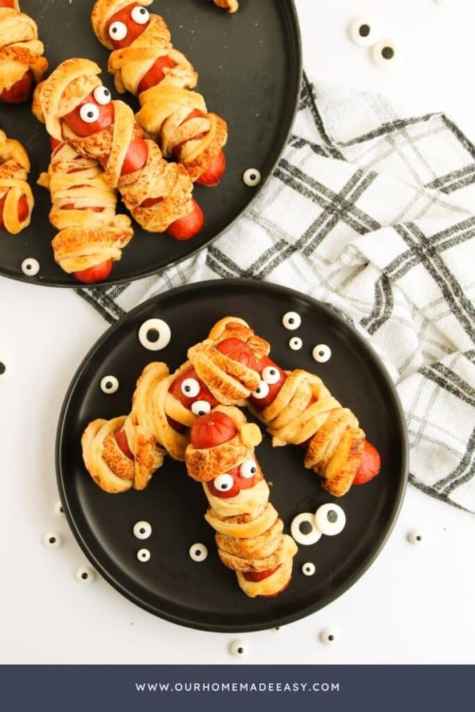 looking down at plate of Mummy dogs