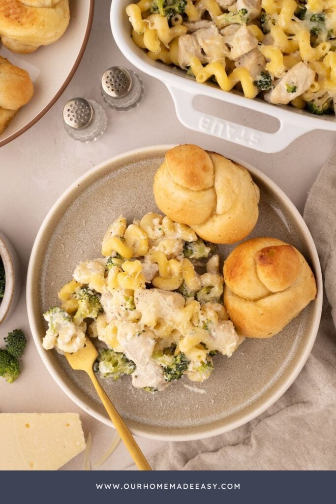 plated chicken, broccoli, cheese, and cavatappi pasta