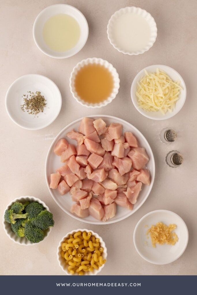 Chicken and broccoli alfredo pasta ingredients on counter top