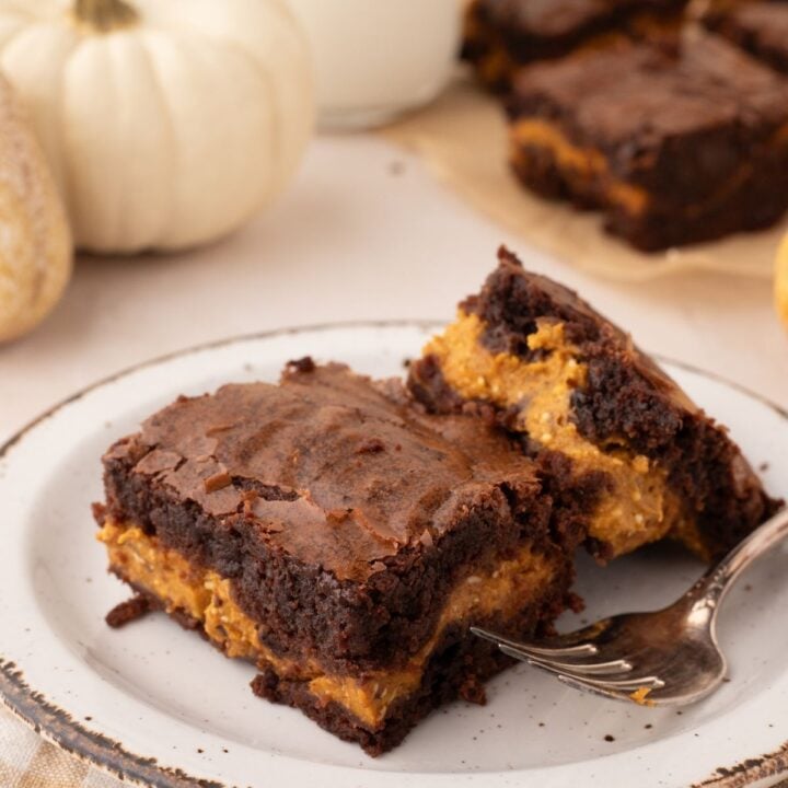 Easy creamy pumpkin brownies on plate