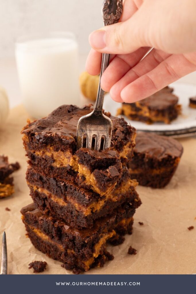 stack of pumpkin pie brownies with cream cheese