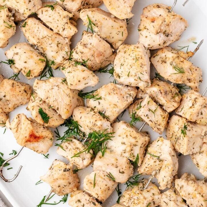 chicken skewers on platter