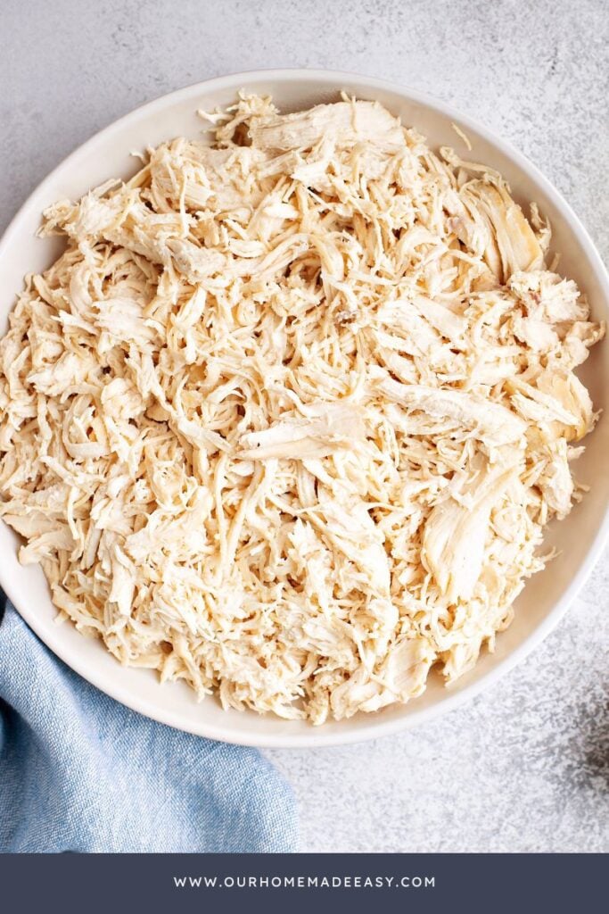 Shredded Costco rotisserie chicken in a bowl