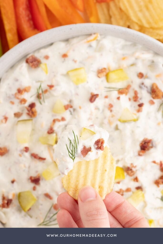 dipping chip into bbq summer dip