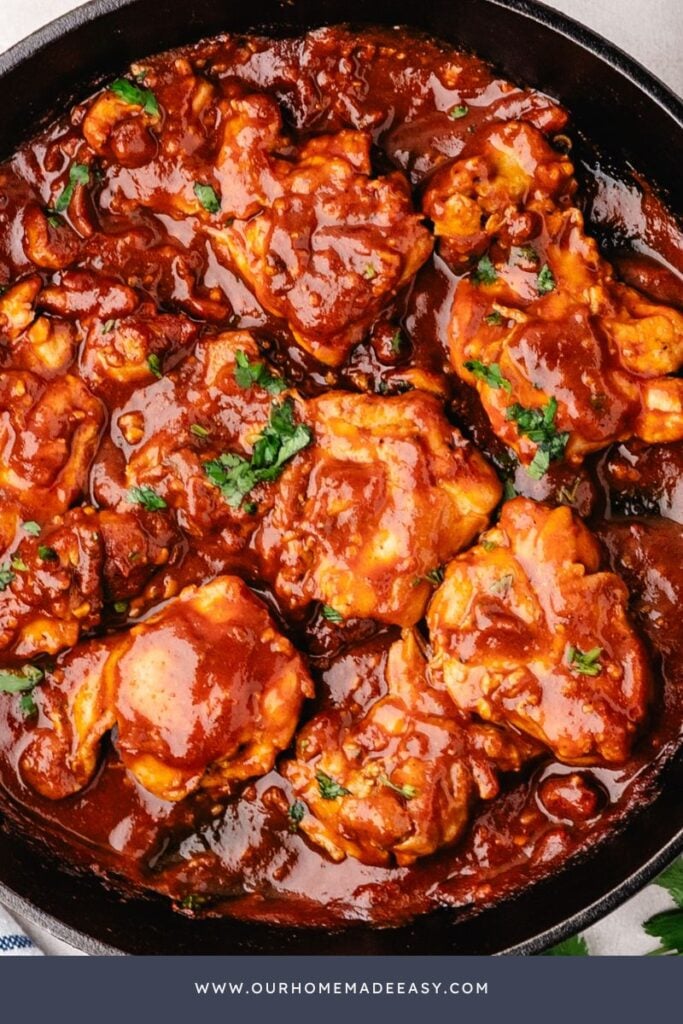 finished glazed chicken in cast iron skillet