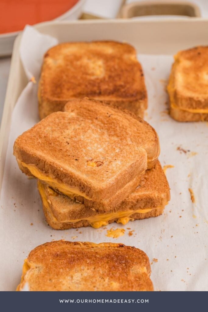 stack of grilled cheese sandwiches for easy dinner idea