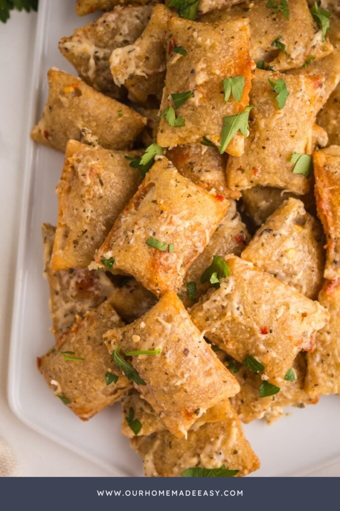 close up of finished parm garlic pizza rolls