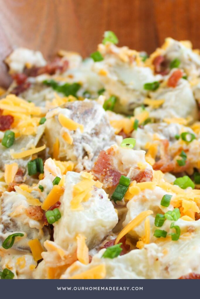 close up of creamy cheesy bacon potato salad