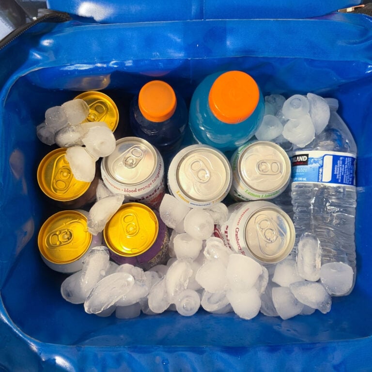 See exactly what I pack in our travel ball tournament coolers, plus my tricks for keeping drinks cold, packing easy lunches, and prepping the night before.