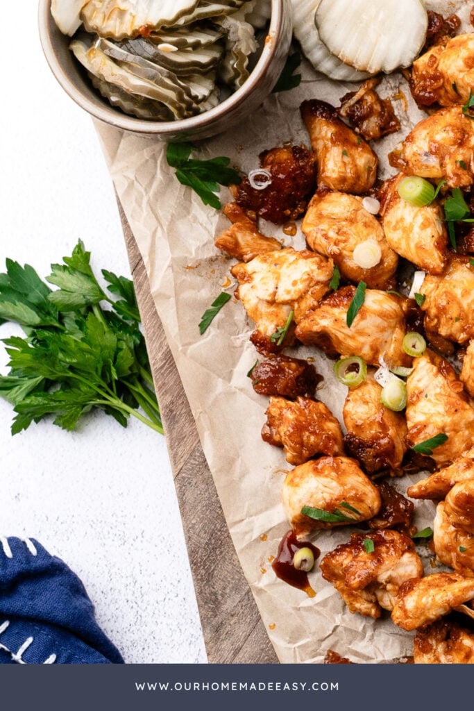 looking down at chicken bites with honey BBQ sauce