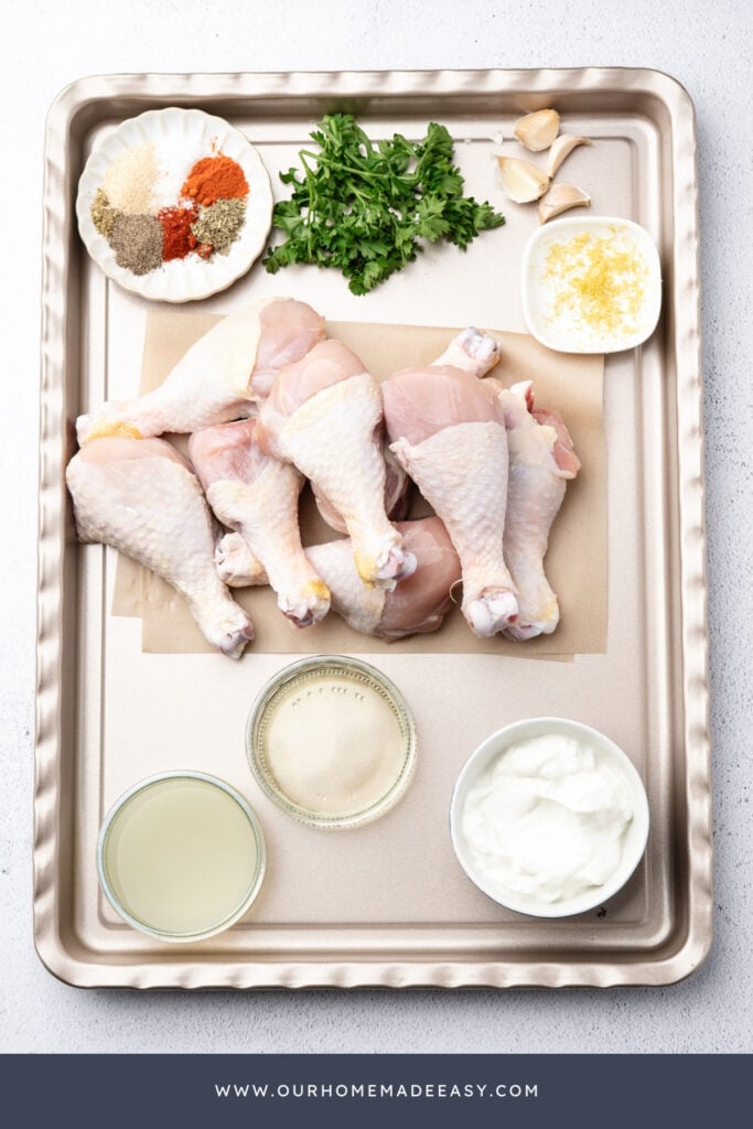 chicken marinade ingredients on baking sheet
